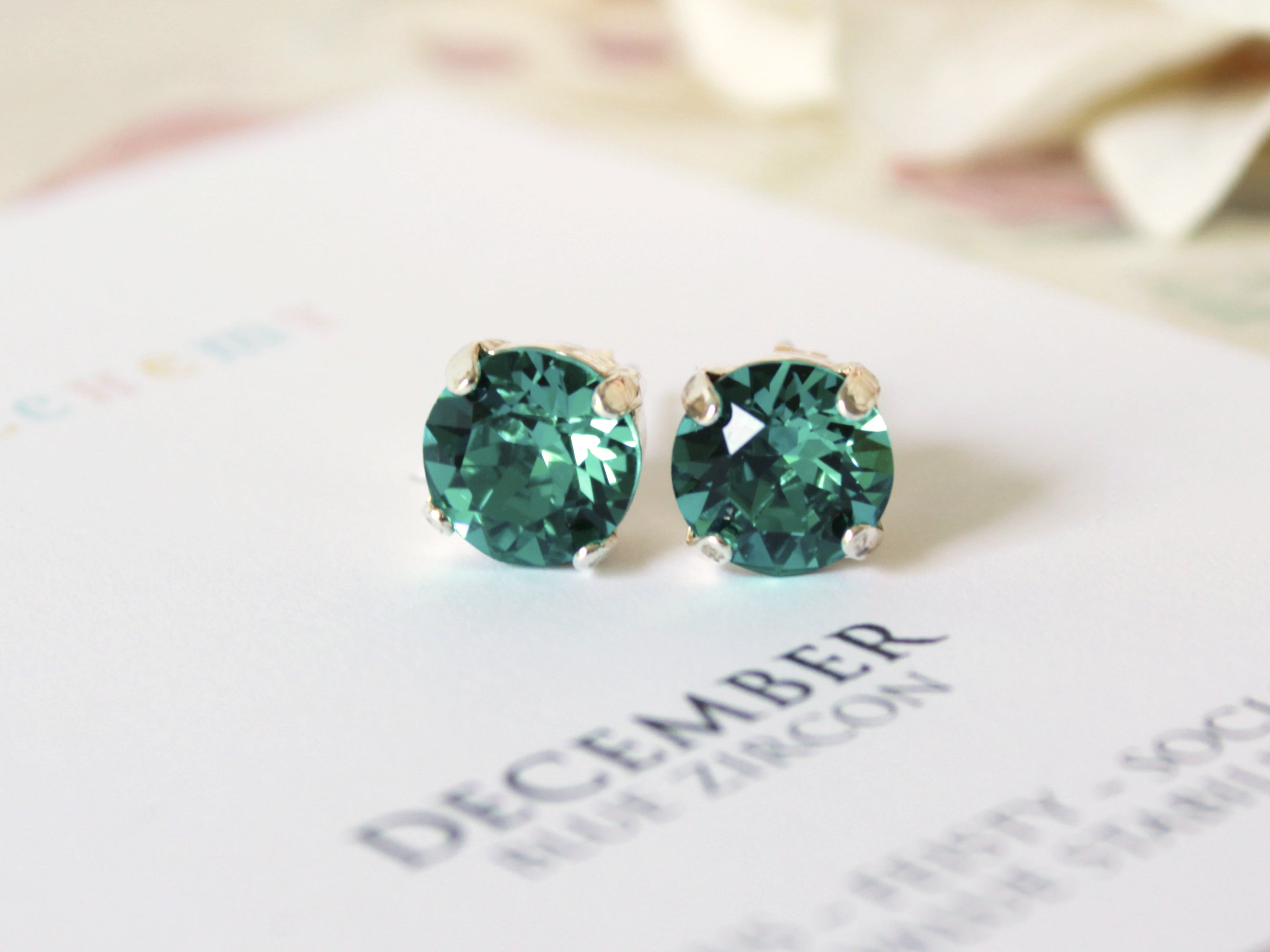 December Birthstone Stud Earrings in Blue Zircon
